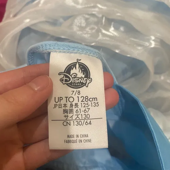 A really pretty Cinderella dress with a glass shoes symbol in amazing condition